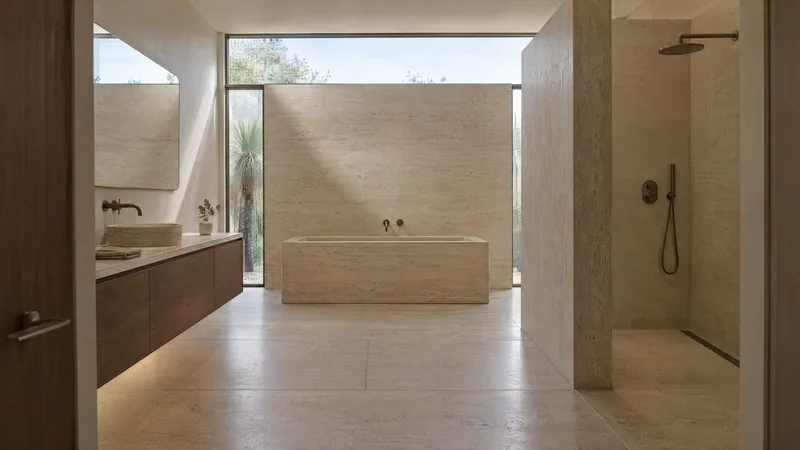 sculpted travertine bathroom design concept